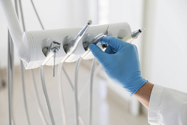 Professional Emergency Dentist technician working in Ponderosa Park, CO